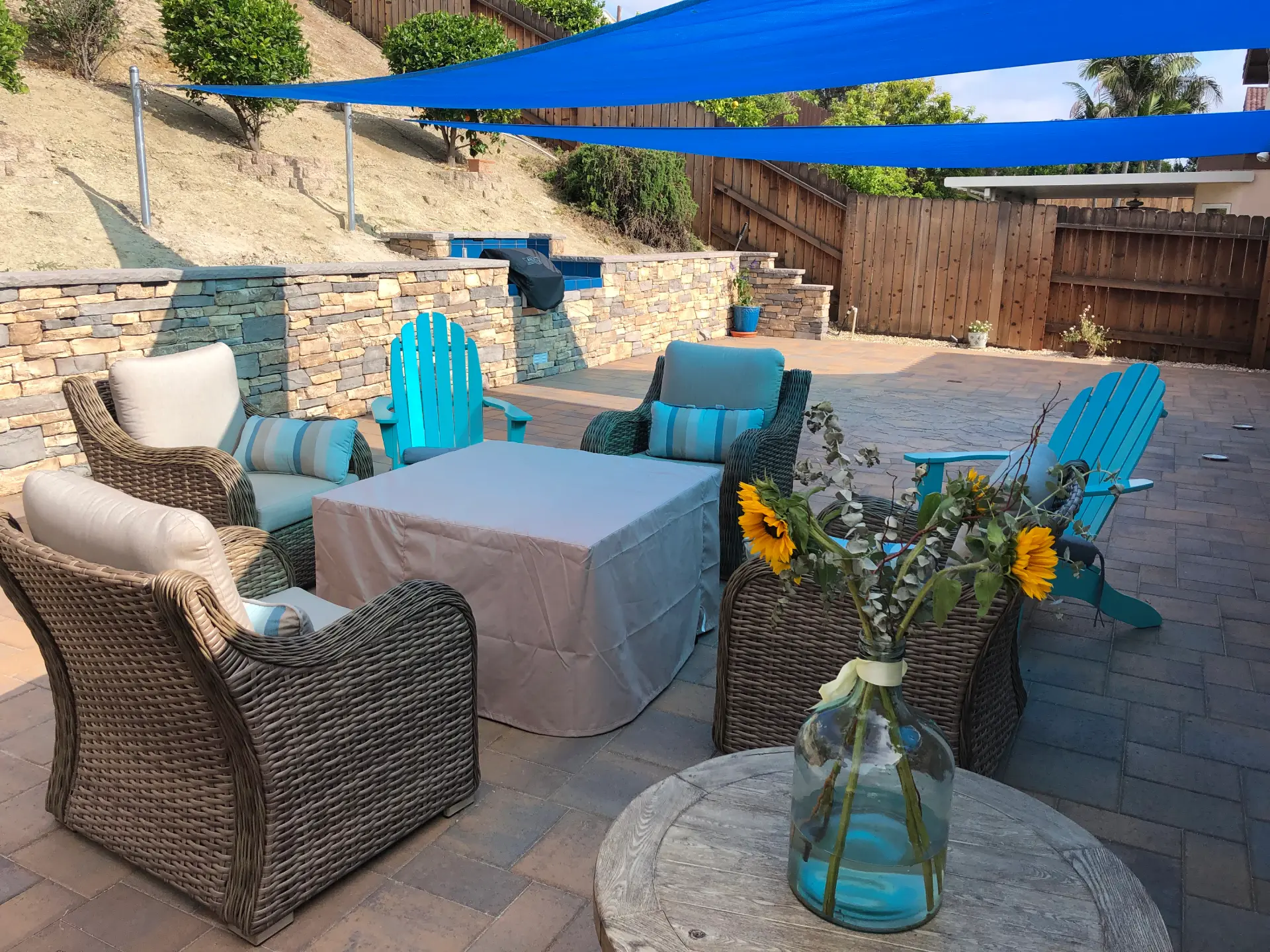 Custom outdoor patio with new stone walls.
